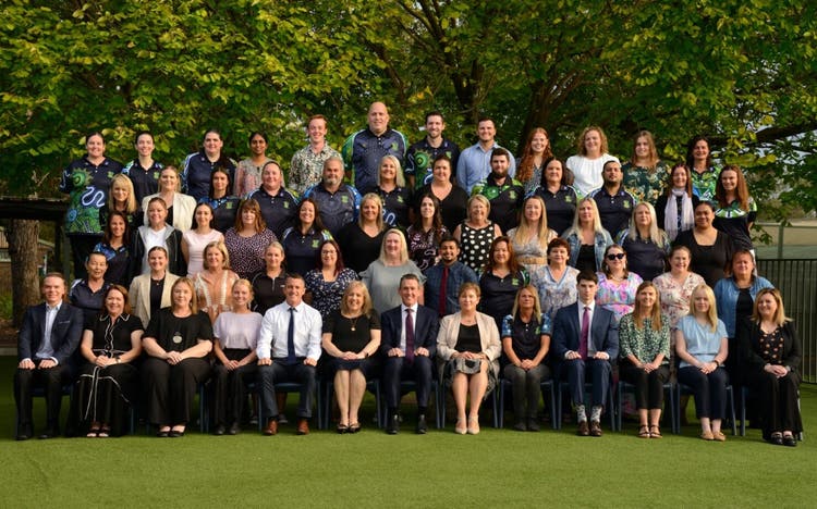 Whole staff image outdoors
